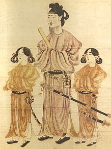 An ancient Japanese handscroll showing Nara period court officials in traditional caps and robes, painted in a classical ink and wash style