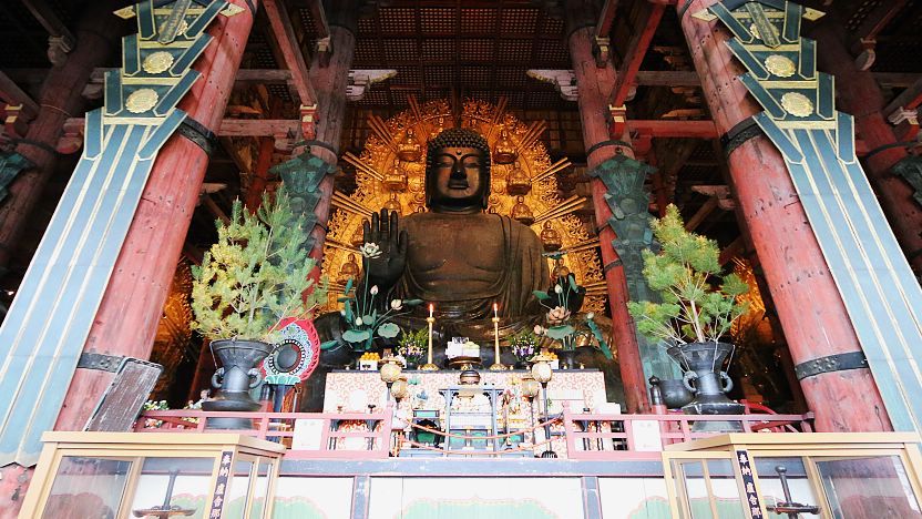 A massive bronze statue of the seated Vairocana Buddha, known as the Daibutsu, located inside the Great Buddha Hall at Todai-ji Temple in Nara, Japan