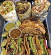 a picture of tacos and burritos