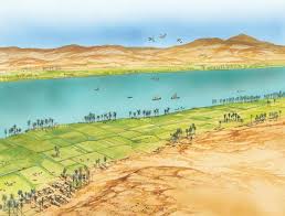 Ancient Egyptians farming along the banks of the Nile River
