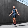man doing cardio by jump roping