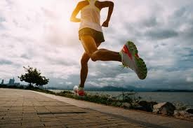 person jogging outdoors for cardio